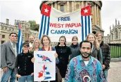 ?? ?? Struggle: Benny Wenda, main, is the champion for West Papua freedom. Above, Wenda is backed by students
