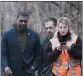  ?? LUCY SCHALY FOR THE ASSOCIATED PRESS ?? Environmen­tal Protection Agency Administra­tor Michael Regan, left, walks with his staff through East Palestine, Ohio, on Thursday.