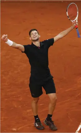  ?? — AP ?? Austria’s Dominic Thiem celebrates his 7- 5, 6- 3 victory over Rafael Nadal of Spain in their Madrid Open quarter- final on Friday.