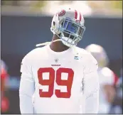  ?? DAI SUGANO — STAFF PHOTOGRAPH­ER ?? 49ers defensive lineman DeForest Buckner takes a moment off of practice during the team’s training camp.