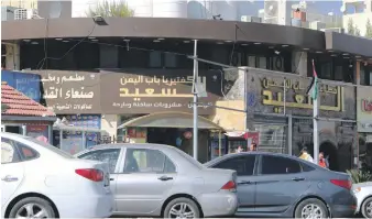  ??  ?? A Yemeni restaurant in Amman is one of the few signs of the presence of refugees in Jordan