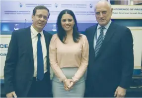  ?? (Avi Hayun) ?? OPPOSITION LEADER Isaac Herzog (left), Justice Minister Ayelet Shaked and Conference of Presidents of Major American Jewish Organizati­ons executive vice president Malcolm Hoenlein attend the organizati­on’s leadership mission to Israel yesterday at the...