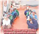  ??  ?? DITAHAN: Nelayan warga Vietnam ditangkap di dalam bot tersebut.