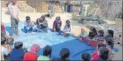  ?? FILE PHOTO ?? A meeting of the anti-child traffickin­g unit, establishe­d by Manav Sewa Sansthan, in progress in a village.