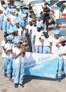  ?? NORMAN GRINDLEY/CHIEF PHOTO EDITOR ?? ISSA-GraceKenne­dy Girls’ Champs winners Edwin Allen took the parade to the streets.