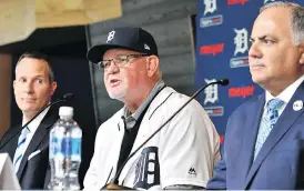  ?? ROBIN BUCKSON/THE ASSOCIATED PRESS ?? Detroit Tigers’ new manager Ron Gardenhire is flanked by Chris Ilitch, left, president and CEO of Ilitch Holdings, Inc., and Tigers general manager Al Avila.