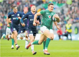  ?? Photo / Getty Images ?? Jacob Stockdale scored the second of Ireland’s three tries.