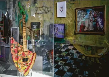  ?? Bebeto Matthews / Associated Press ?? The “Pizza Guitar” from musician Andrew W.K. is but one art exhibit celebratin­g pizza at the Museum of Pizza in Brooklyn. The pop-up museum closes Nov. 18, and there is no takeout.