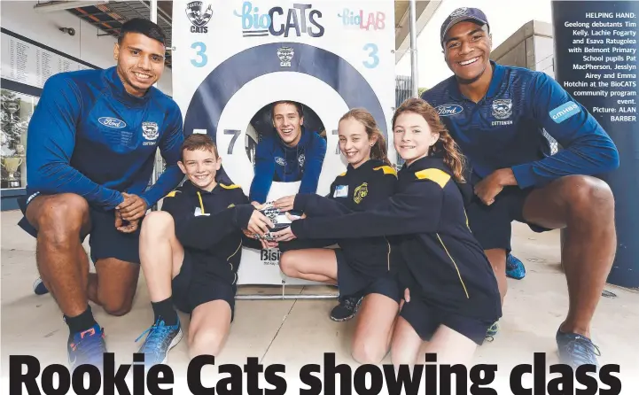  ?? Picture: ALAN BARBER ?? HELPING HAND: Geelong debutants Tim Kelly, Lachie Fogarty and Esava Ratugolea with Belmont Primary School pupils Pat MacPherson, Jesslyn Airey and Emma Hotchin at the BioCATS community program event.