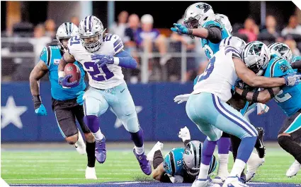  ?? FOTO: AFP ?? Ezekiel Elliott
(21) tuvo un gran partido de más de 140 yardas terrestres.