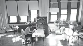  ?? MATT ROURKE/AP FILE ?? Teacher Laura Bonanni prepares her classroom for in-person learning at Nebinger Elementary School in Philadelph­ia recently.