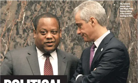  ?? AP FILES ?? Ald. Roderick Sawyer talks with Mayor Rahm Emanuel during a City Council meeting in 2015.