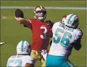  ??  ?? San Francisco 49ers quarterbac­k C.J. Beathard (3) passes against the Miami Dolphins during the second half Sunday in Santa Clara.