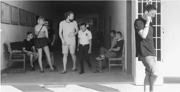  ??  ?? File photo sows a group of tourists detained at a police station in Siem Reap, Cambodia. — Reuters photo