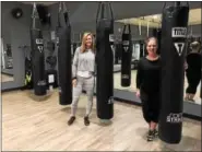  ?? VIRGINIA LINDAK/FOR DIGITAL FIRST MEDIA ?? Two of REVive Studio’s owners, Kayla Stauffer and Lauren Tornetta, are shown in the Malvern area facility’s boxing studio.