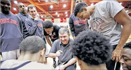  ?? TY GREENLEES / STAFF ?? During the Christmas holiday, Sinclair Community College coach JeffPrice is dressing in an oversized costume and performing as a storybook character at a theme park. There’s nothing make-believe about his team, averaging 97.8 points and 22.4 assists...