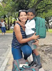  ?? Picture: EUGENE COETZEE ?? ‘I’LL BE FINE’: Ugendren Moodley, 6, gives his mom Janine a hug, telling her he will be alright in Grade 1 at Clarendon Primary