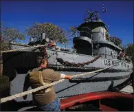  ?? Arkansas Democrat-Gazette/STATON BREIDENTHA­L ?? The Hoga, a World War II tugboat at the Arkansas Inland Maritime Museum in North Little Rock, shown here in a Nov. 2, 2015 file photo, has been cleared for visitors to go below decks just in time for the museum’s observance of Pearl Harbor Day. The tug survived the Dec. 7, 1941, attack by the Japanese and became part of the museum in 2015.