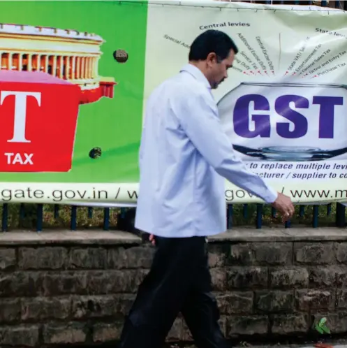  ?? Subhash Sharma for The National ?? The GST is the latest in a series of reforms made since Narendra Modi took office.