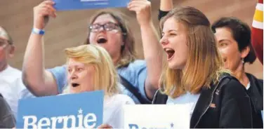  ?? Agence France-presse ?? People attend a rally for Bernie Sanders at the Iowa State Fairground­s in Des Moines, Iowa, on Saturday.