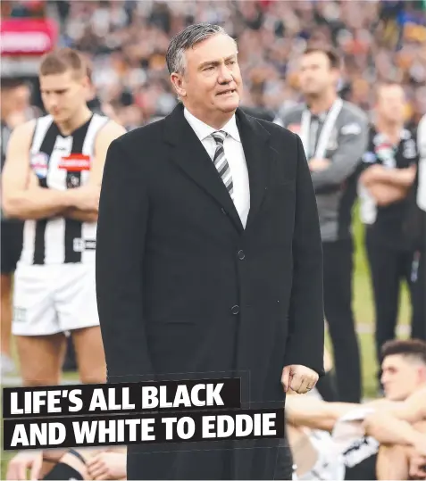  ?? Picture: GETTY IMAGES ?? BAD DAY: Dejected Collingwoo­d president Eddie McGuire stands among his Magpies after the 2018 Grand Final loss.