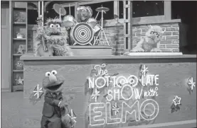  ??  ?? Muppet character Elmo, bottom left, will host a family friendly show called “The Not Too Late Show with Elmo.” It begins streaming May 27 on HBO Max.