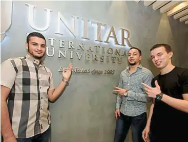  ??  ?? Libyan students happy to be studying in UNITAR.