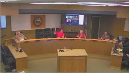  ?? SCREENSHOT VIA YOUTUBE ?? Left to right, Oroville councilors Art Hatley, Mayor Chuck Reynolds, David Pittman and Vice Mayor Scott Thomson listen Tuesday as Reynolds talks about a Miners Alley arch project during the Oroville City Council meeting. Councilors Krysi Riggs and Janet Goodson joined the meeting via video and Councilor Eric Smith is not pictured.