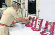  ?? PRABHAKAR SHARMA/HT ?? Police commission­er Sanjay Agarwal pays tribute to police officers who died in the Jaipur blasts nine years ago.