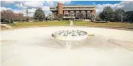  ?? JACOB LANGSTON/STAFF PHOTOGRAPH­ER ?? UCF’s Reflecting Pond is drained and out of service for several months after it was damaged during Hurricane Irma.