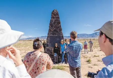  ?? JOHN BURCHAM/THE NEW YORK TIMES PHOTOS 2022 ?? Tourists visit the Trinity Site obelisk, which marks ground zero at White Sands Missile Range in New Mexico.