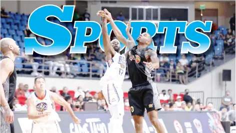  ?? (PBA photo) ?? NLEX Road Warriors’ Jonathon Simmons shoots over the defense of TNT Tropang Giga’s Jalen Hudson.