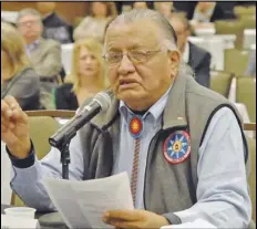  ?? ASSOCIATED PRESS FILES ?? Jesse Taken Alive of the Standing Rock Sioux Tribe testifies in Bismarck, N.D., before the Task Force on American Indian Children Exposed To Violence in 2013. Alive, the former chairman of the tribe, died Monday after contractin­g COVID-19. He was 65.