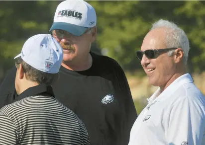  ?? HARRY FISHER/THE MORNING CALL ?? Andy Reid, then head coach of the Eagles, with owner Jeffrey Lurie during Eagles training camp at Lehigh University in 2011, the year before Lurie fired Reid.