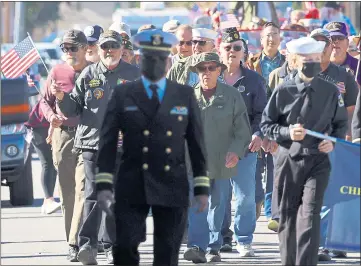  ?? PHOTOS BY SHMUEL THALER — SANTA CRUZ SENTINEL ?? Local veterans parade up East Beach Street in Watsonvill­e as they are honored during the annual Veterans Day parade on Thursday.