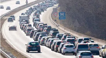  ?? AFP ?? Motorists drive their vehicles at reduced speed on the A 43 highway near Chignin in the French Alps, as people make their way to ski resorts in the French Alps.—