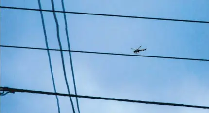  ?? SAM HODGSON U-T ?? Local leaders are saying lingering San Diego Police Department helicopter­s over some neighborho­ods create a tense atmosphere.