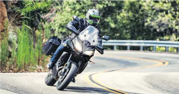  ?? — KAWASAKI ?? The lightweigh­t Versys 650 LT is handling dream, bending into curves with just the slightest tug of the handlebar.