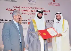  ??  ?? MANAMA: IICO Chairman Dr Abdullah Al-Maatouq is honored during the Seventh Annual Conference for Effective Partnershi­ps and Informatio­n Sharing For Better Humanitari­an Action. —KUNA