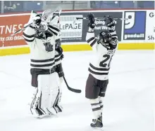  ?? BOB TYMCZYSZYN/POSTMEDIA ?? The Peterborou­gh Petes celebrate as they defeated the Niagara IceDogs in Game 4 of the Eastern Conference quarter-final series on Thursday night at the Meridian Centre in St. Catharines. Peterborou­gh won the game 6-2 to sweep the series 4-0 and advance...