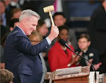  ?? Win McNamee / Getty Images / TNS ?? U.S. Speaker of the House Kevin McCarthy celebrates Saturday after being elected in the House Chamber at the Capitol in Washington. After four days of voting and 15 ballots, McCarthy secured enough votes for the 118th Congress.