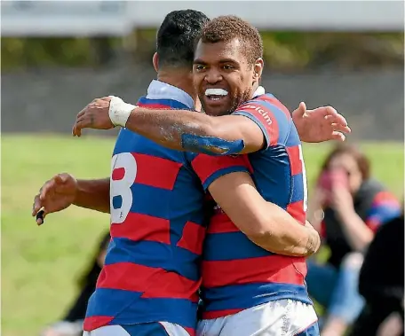  ??  ?? Buller’s Penijamini Nabainival­u celebrates his try with team-mate Daniel Hytongue.