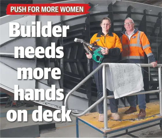  ?? Picture: Nikki Davis-Jones ?? Apprentice fabricator Alice Clarke and PFG Group’s Stephen McCullum with a defence boat under constructi­on in Hobart.