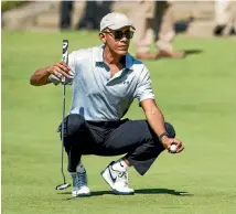  ?? GETTY IMAGES ?? Barack Obama found time to get in a round of golf at St Andrews before speaking at a £2000-a-head dinner in Edinburgh.