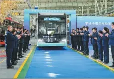  ?? ?? Electric buses heading to Qatar roll out of Yutong’s production line in Zhengzhou, Henan province, in December 2021.