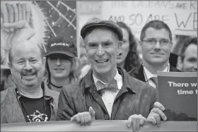  ?? AP/SAIT SERKAN GURBUZ ?? Bill Nye (center), chief executive of the Planetary Society who is known as the “Science Guy,” joins the march Saturday in Washington as honorary co-chairman.