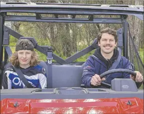  ?? PHOTO: DUBBO PHOTO NEWS/EMY LOU ?? Alex Mendham (right) demonstrat­es the safety features of a Polaris sideby-side to 14-year-old Brayden Field.