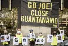  ?? Valentin Bianchi/Associated Press ?? Protesters at a demonstrat­ion during a NATO summit in Brussels on Monday hold photos of people being held at the U.S. detention facility at Guantanamo Bay, Cuba.