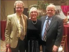  ?? PEG DEGRASSA — DIGITAL FIRST MEDIA ?? Attending Hedgerow Theatre Company’s Belle of the Ball Benefit at the Old Mill Friday night are Hedgerow patrons, left to right, John Pollack and Lynne Farrington, both of Mount Airy, and Brian Boland of Rose Valley.