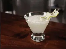  ?? PHOTO COURTESY OF BOARDROOM SPIRITS ?? Boardroom Spirits shakes up a cucumber martini.